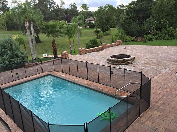 Pool, fire pit, paver deck