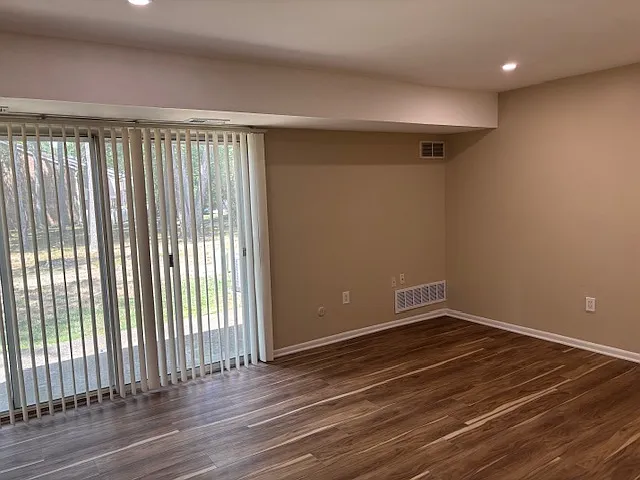 Living room patio door leading to rear open space