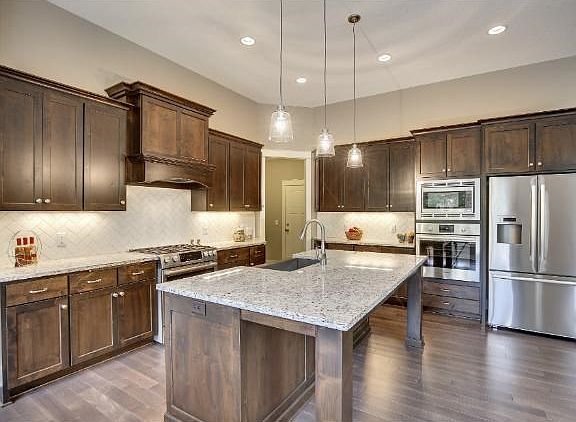 Gourmet style kitchen with wood floors throughout (maple)