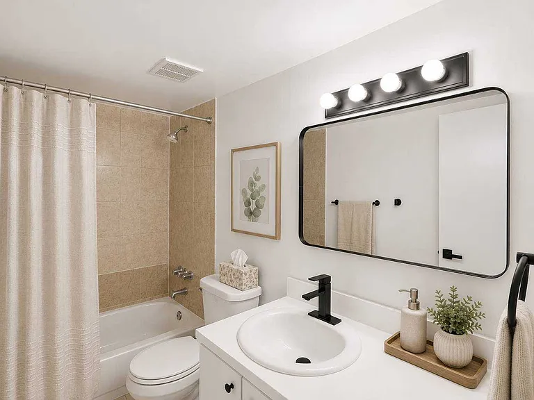 Elevate your living with modern comforts in this stylish bathroom at Clear Lake Palms Apartments. Featuring sleek fixtures, a spacious layout, and thoughtful design, it's perfect for relaxation and refreshment. Schedule your tour today!