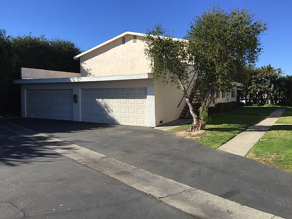Back view showing garage