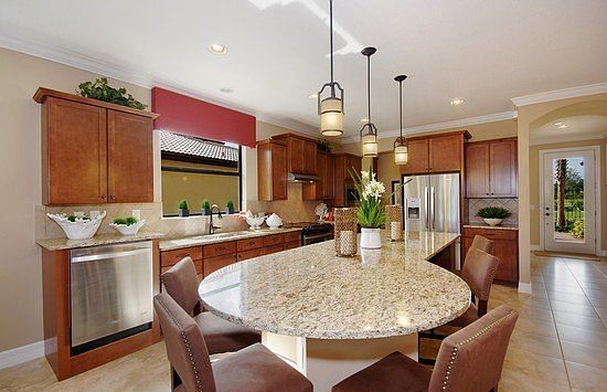 Kitchen with Granite Countertops and Staggered Cabinets