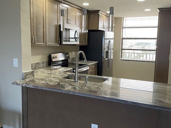 5th image of 7600 Sun Island Dr S APT 706