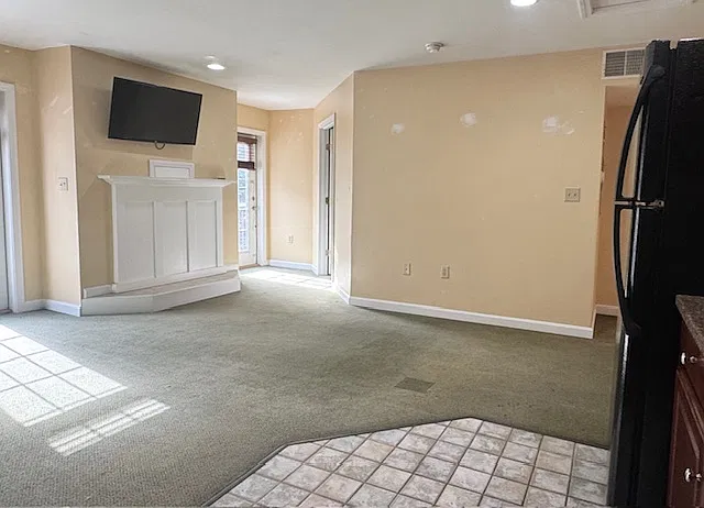 looking towards back doors to deck and bedroom