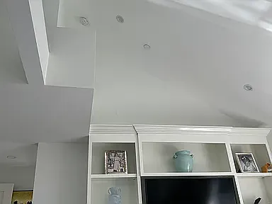 Master bedroom - vaulted ceiling, built in shelves and drawers