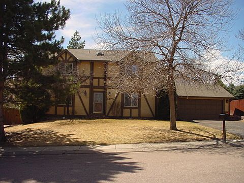 CUSTOM BUILT TUDOR STYLE HOME