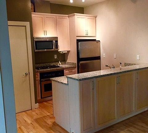 Kitchen with Washer Dryer closet on left