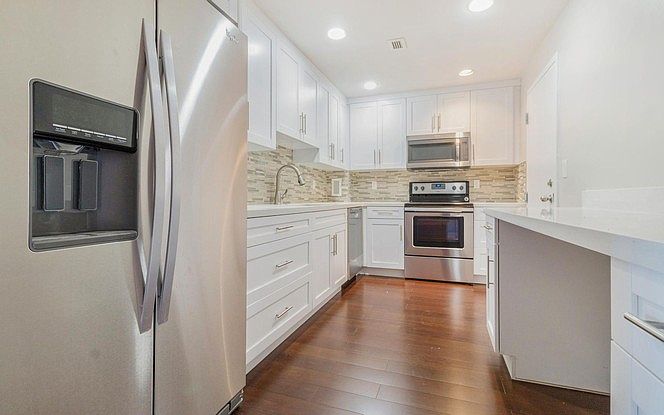 Brand new kitchen with stainless steel appliances