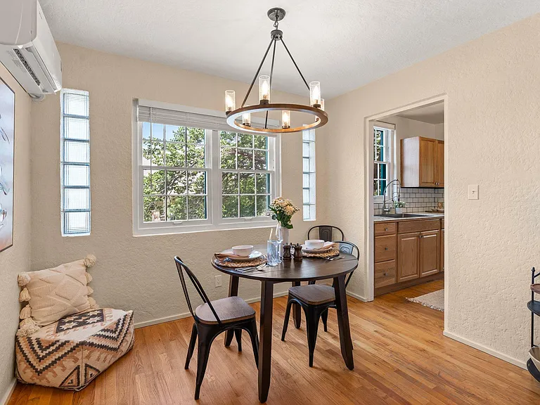 Enjoy a delicious meal with your travel partner in the cozy dining nook.