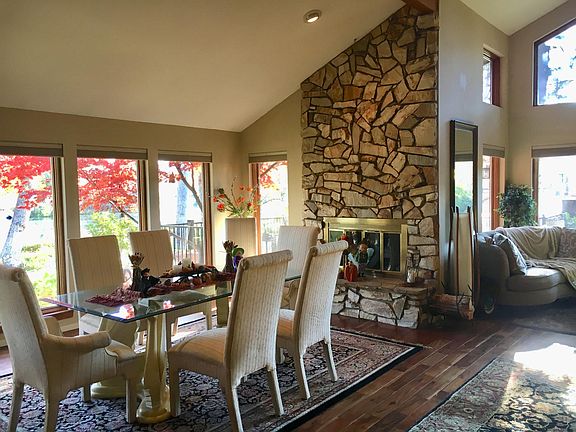 Formal dining room overlooking lake.
