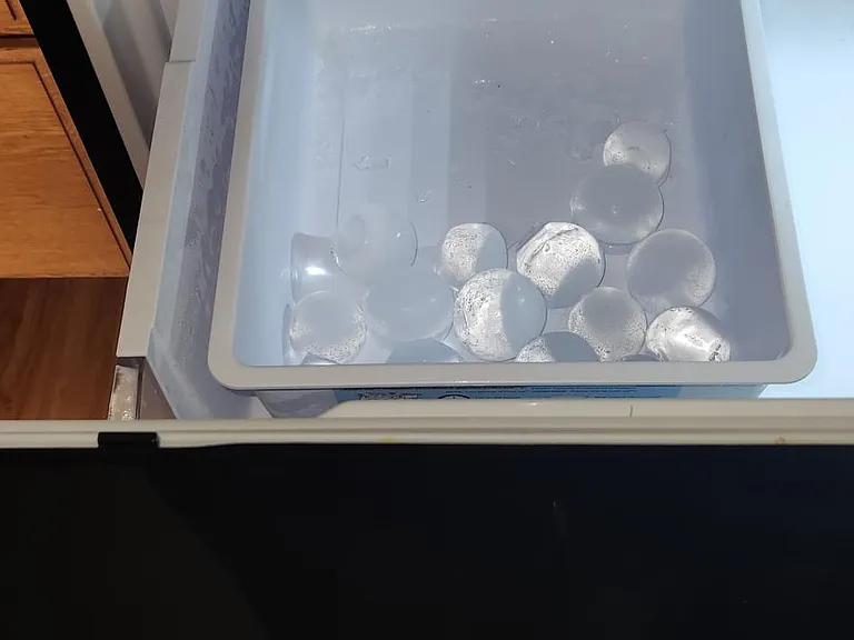 Refrigerator with built in "Ice maker".