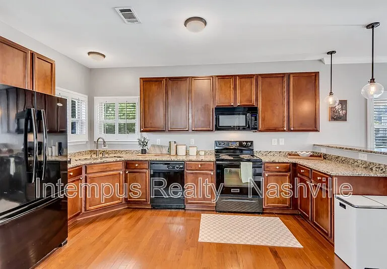 1128 Woodbury Falls Ct — Photo 9