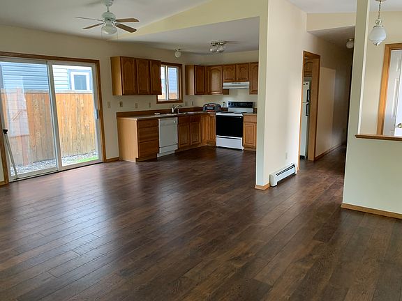 Kitchen from living area looking out to the patio.