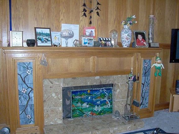 Custom oak fireplace w/ granite