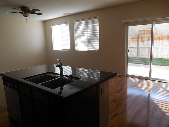View looking from kitchen to nook area