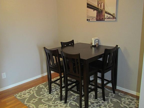 Plenty of room for a dining table! Hardwood flooring through kitchen and dining room.