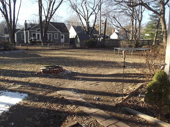HUGE park-like backyard with built in firepit. GREAT for ent