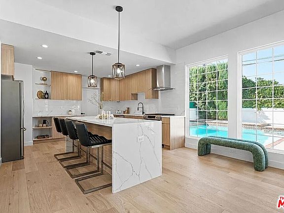3rd image of 4955 Woodman Ave