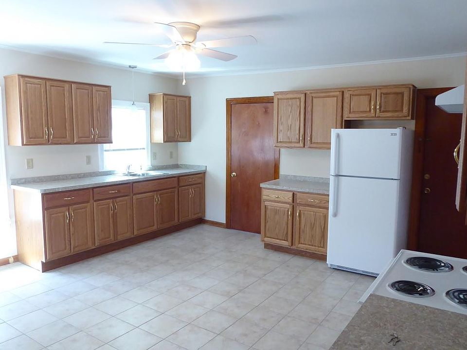 Large kitchen, new counters, cabinets, tile floor, brand new