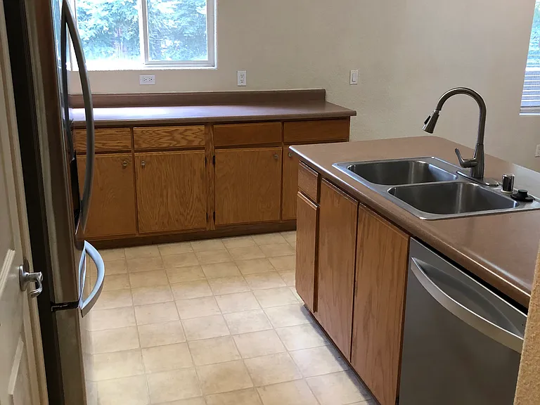 Kitchen with plenty of storage cabinets and counter space.