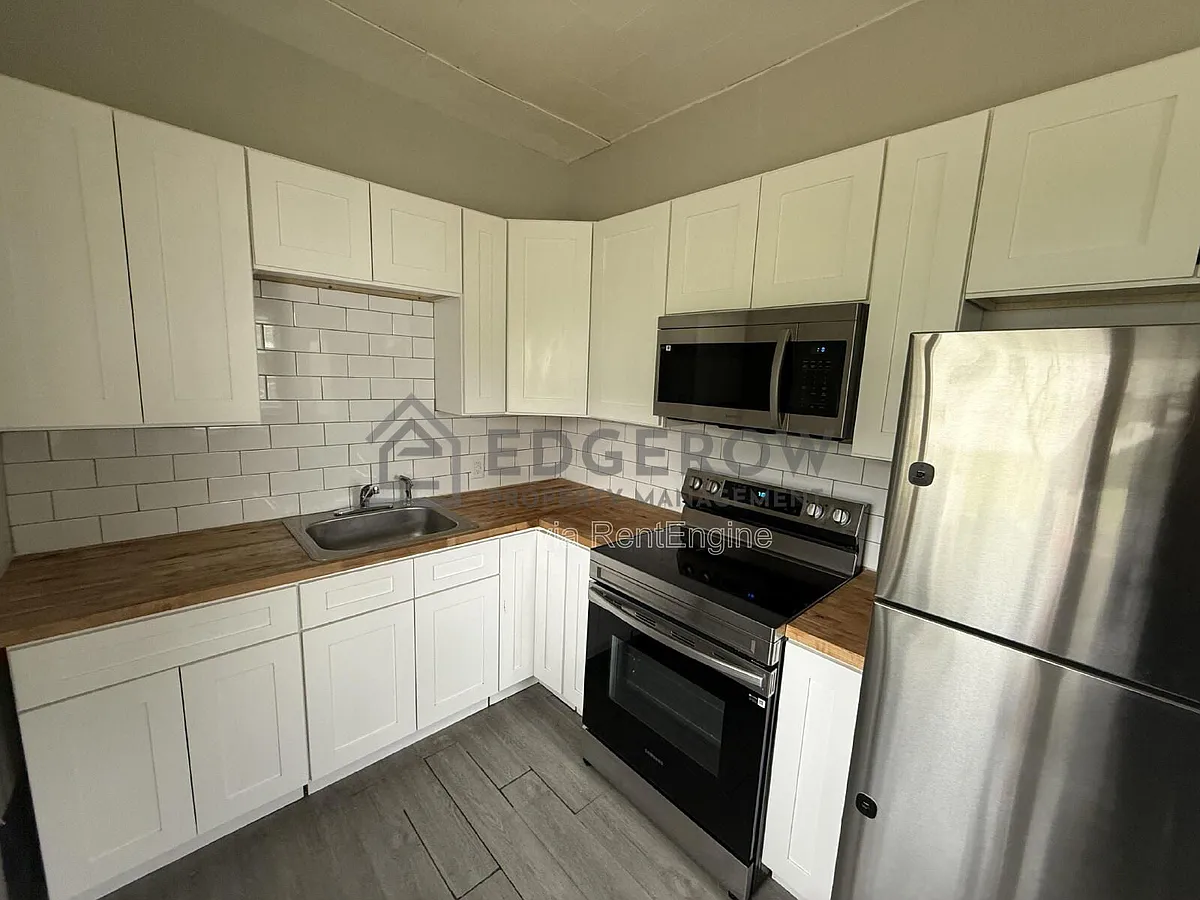 Building Photo - 217 E Ellis Ave #2