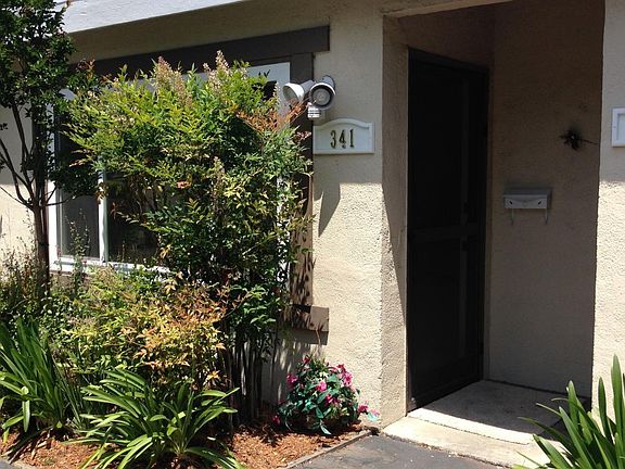 FRONT DOOR HAS EASY ACCESS FROM OFF STREET PARKING IN REAR OF COMPLEX