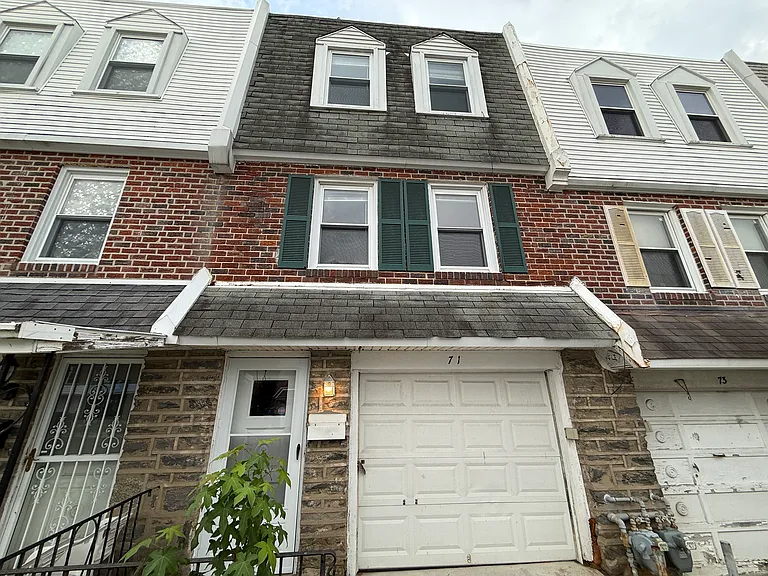 71 Suburban Ln — Photo 1