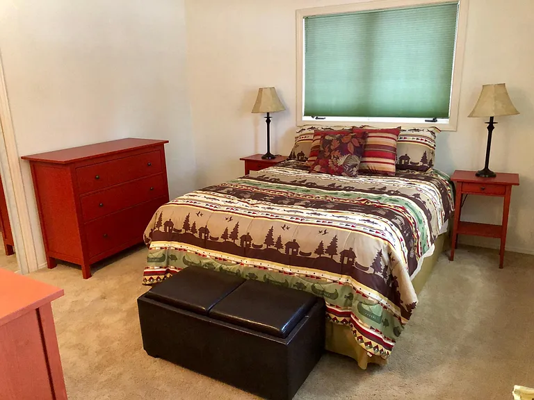 Downstairs front bedroom with queen bed
