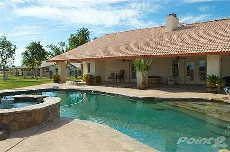 salt water pool with spa with pebble tec surface