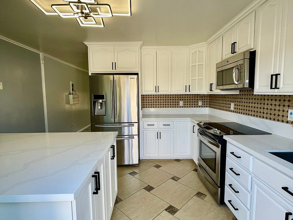 Custom kitchen with a large movable island