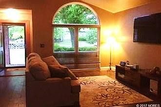 LIVING ROOM WITH LARGE FRONT WINDOW