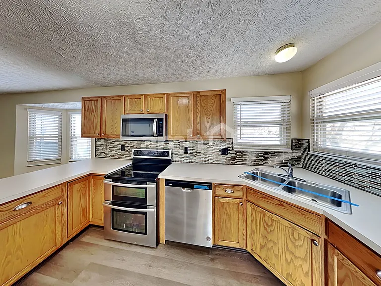 5798 Sharets Dr — Photo 3