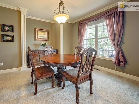 Formal Dining with Lots of Crown Molding