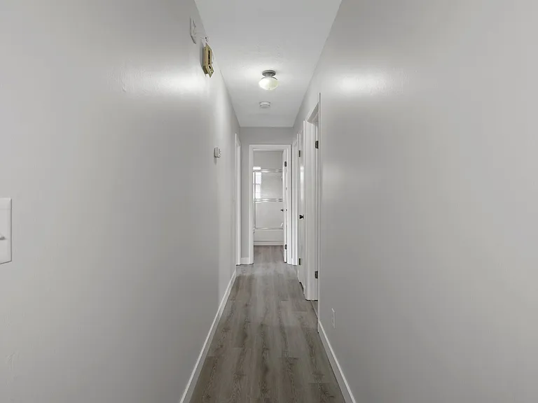 Hall to 3 bedrooms