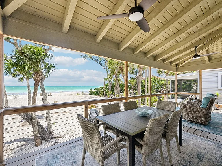 Porch facing the beach and water