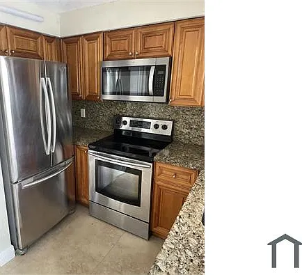 8702 NW 38th Dr #6 — Photo 14