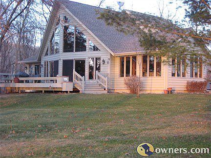Front of cabin facing lake-sun room on right