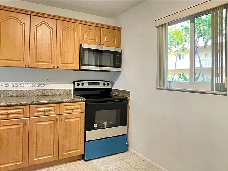 7730 Camino Real #F-113 — Photo 4
