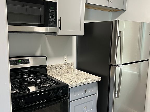 New appliances and hardwood cabinets