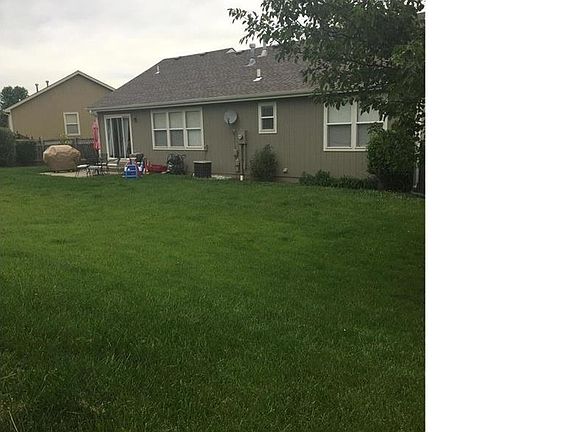 Flat and generous backyard with fence.