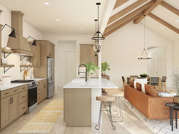 Kitchen with spacious island and pendant lighting