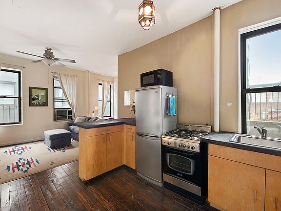 2nd image of 32 E 2nd St APT 19