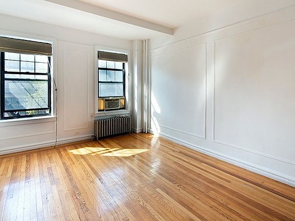 3rd image of 141 E 3rd St APT 4C
