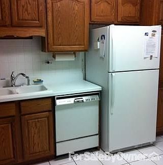 Kitchen
						:
						Includes all appliances, oak cabinets, roll out drawers, tile floor, backsplash