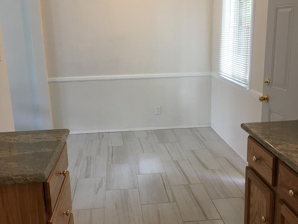 New flooring, new kitchen lower cabinets with granite tops, new paint, new lighting, new mini-blinds, new ceiling light-fan, new plumbing.