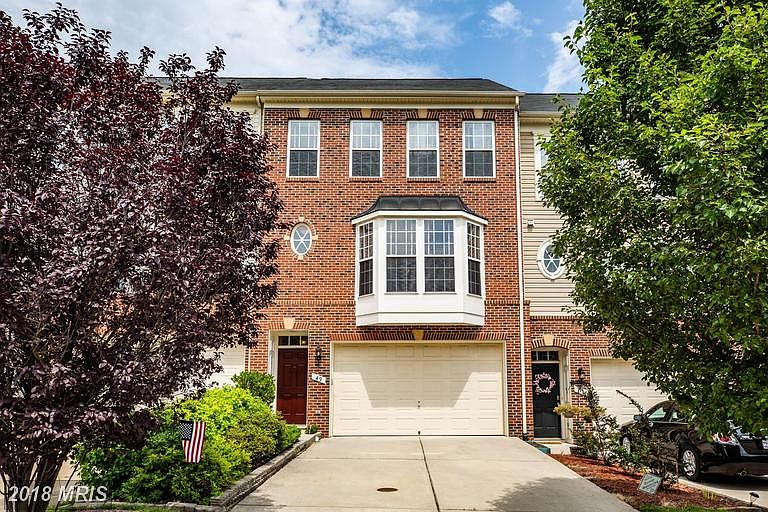 Stunning brick-front garage TH w/over 2,700 SF!