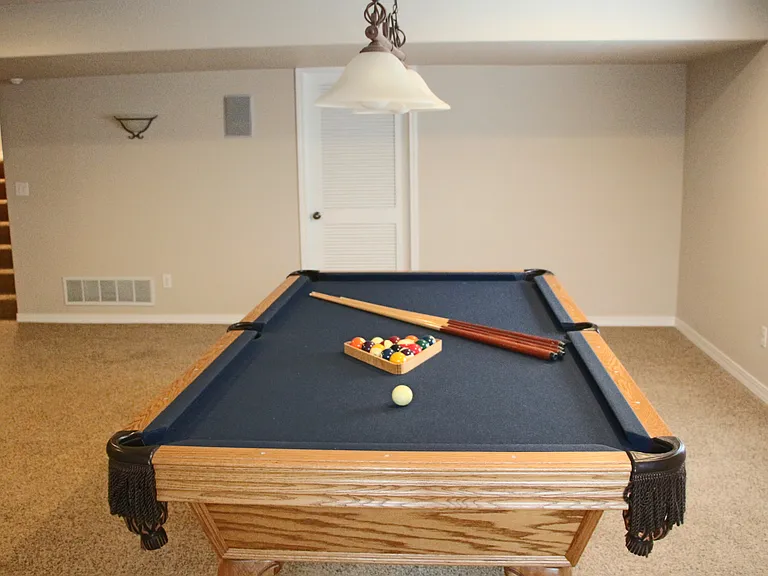 Basement with Pool table / ping pong top