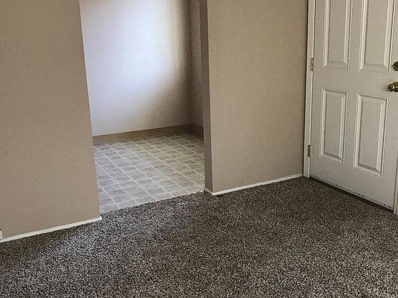 Living room leading into dining area