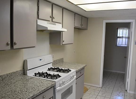 REMODELED, GRANITE COUNTERS AND PAINTED CABINETS