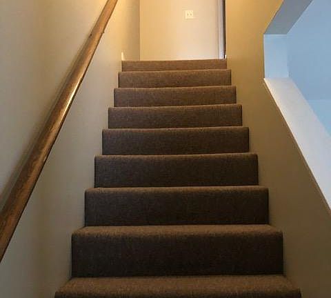 Stairs to the 2 bedrooms